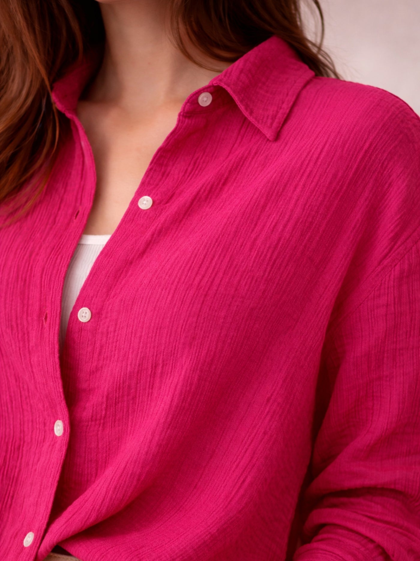 Back view of oversized pink cotton shirt
