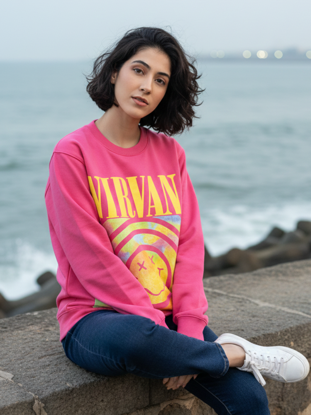 Front view of pink graphic print sweatshirt for women