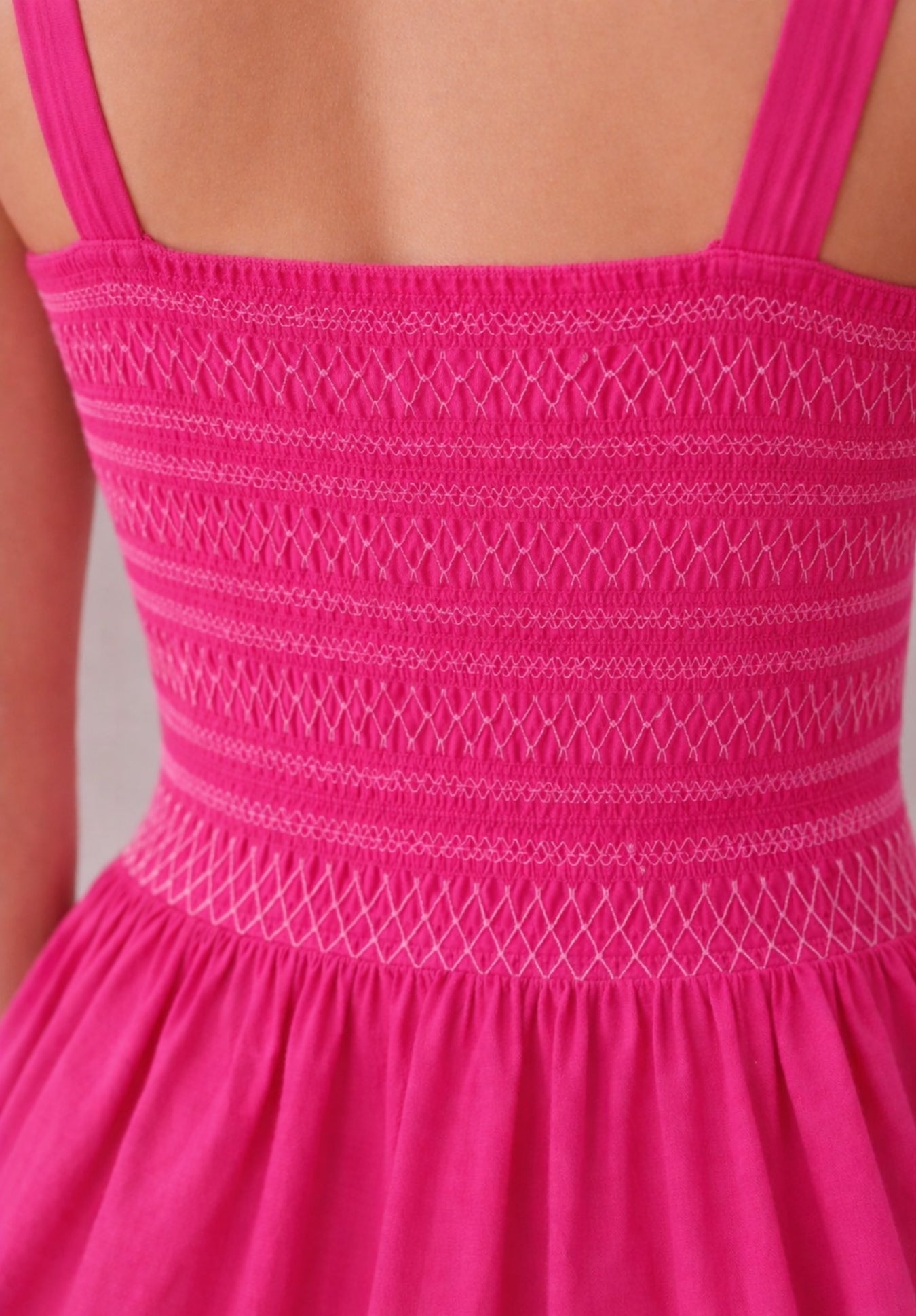 Pink cotton A-line dress fabric and pleat detail