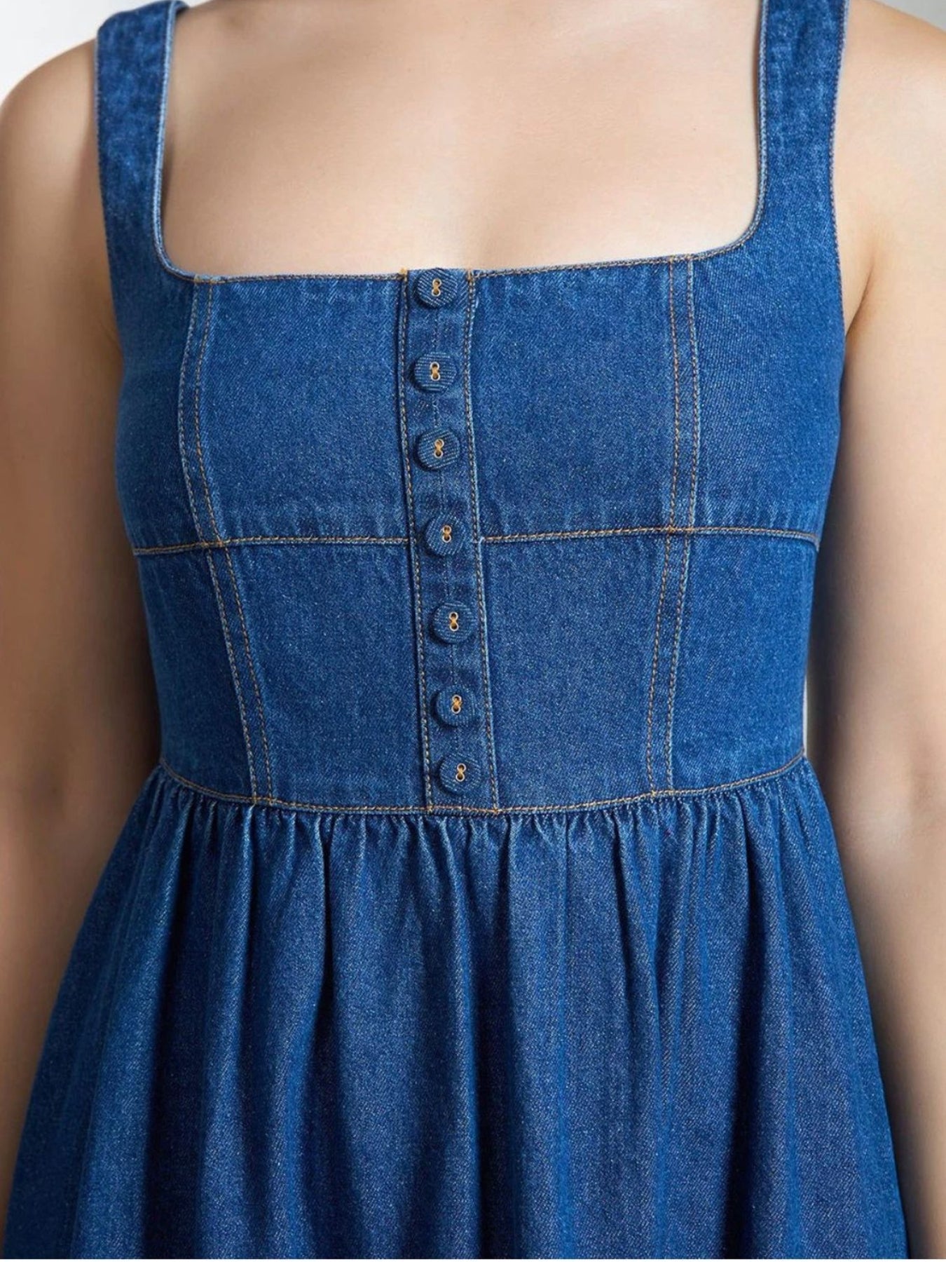Close-up of denim fabric texture and stitching