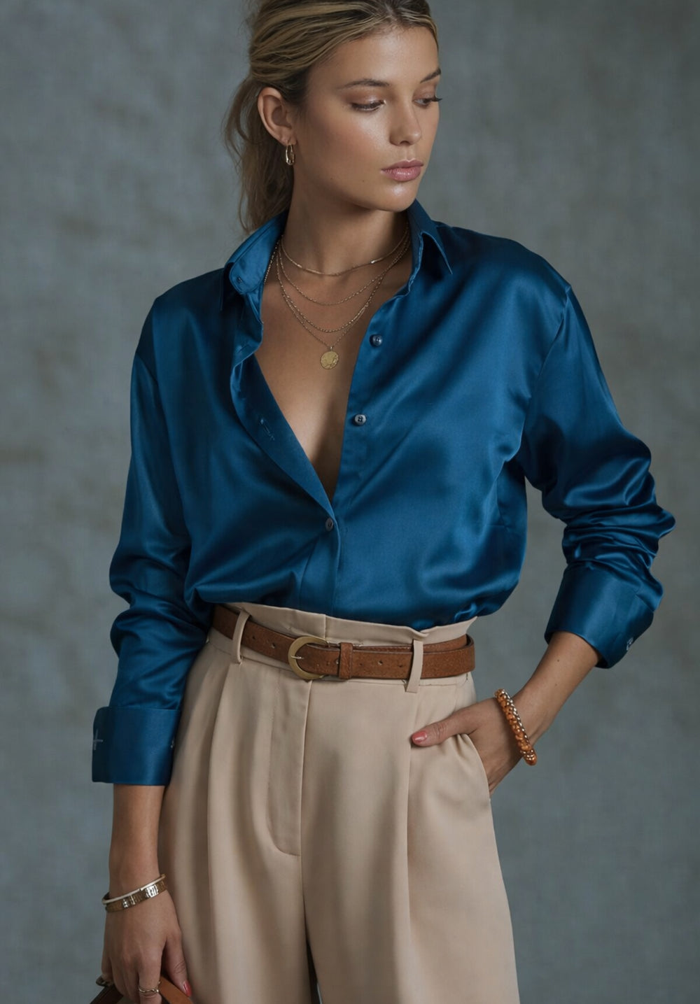 Front view of navy blue satin shirt with spread collar