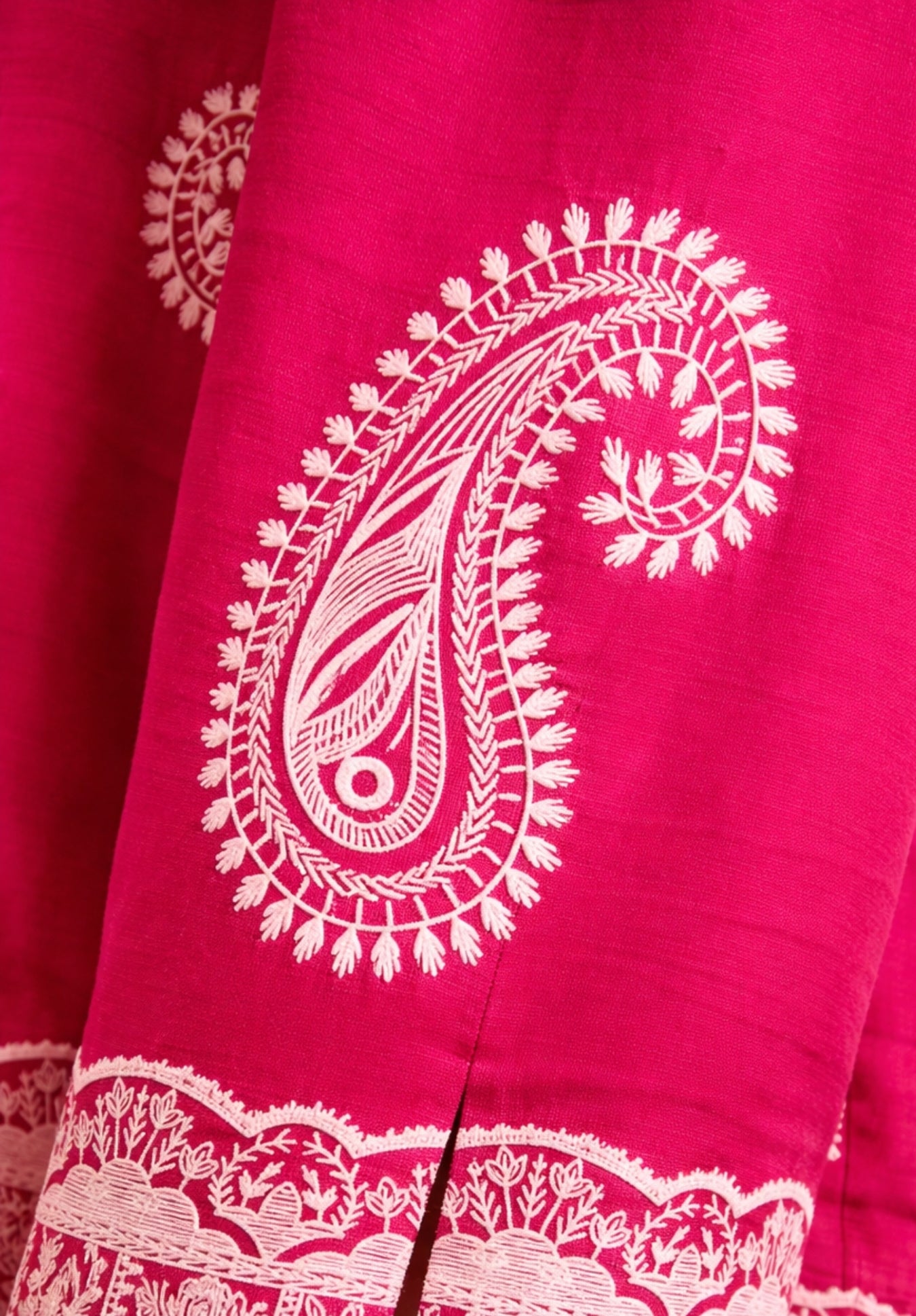 Curved hem detail of pink oversized puff print shirt