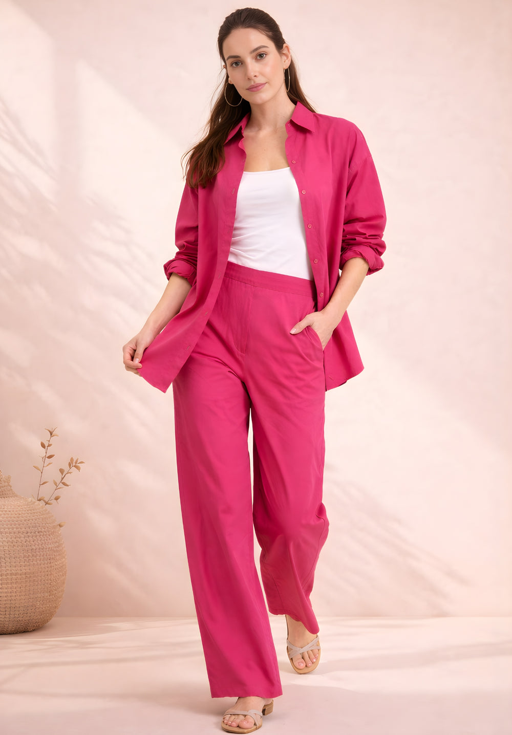 Side angle of hot pink poplin cotton co-ord on model