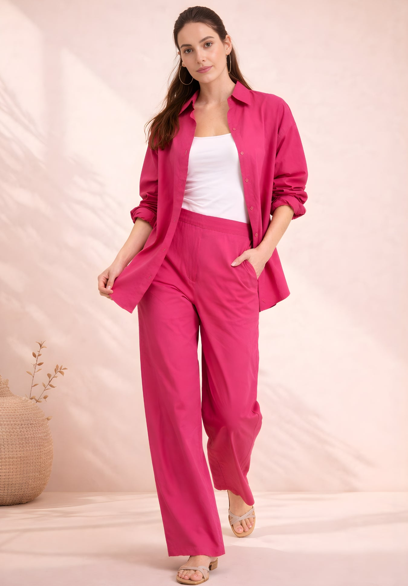 Side angle of hot pink poplin cotton co-ord on model