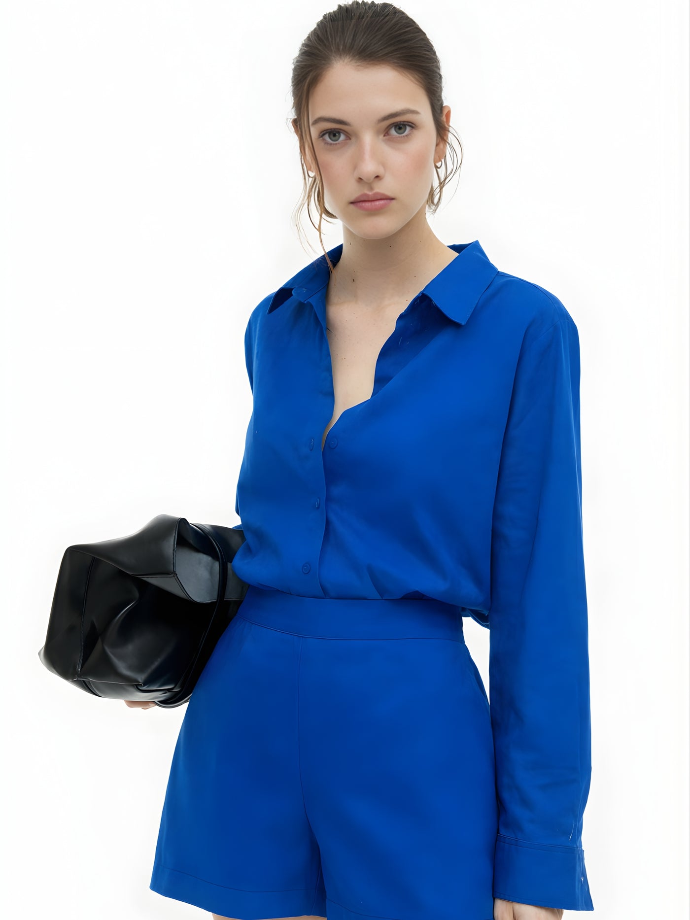 Side angle of royal blue poplin cotton co-ord on model