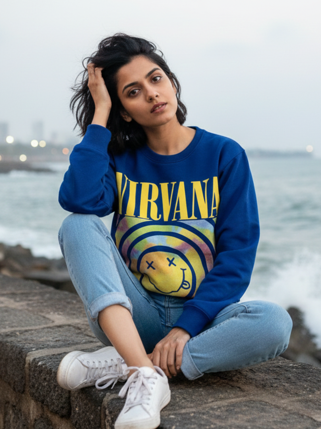 Front view of blue graphic print sweatshirt for women