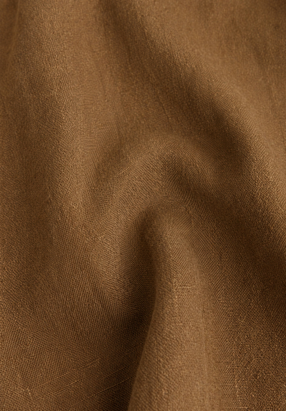 Side view of taupe baggy trousers in linen viscose blend