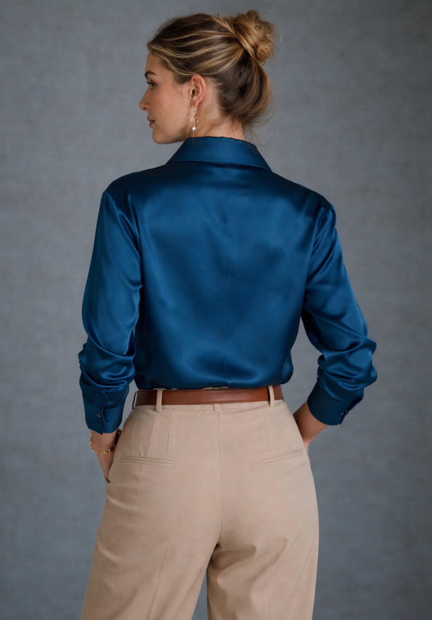 Side view of navy blue satin shirt styling