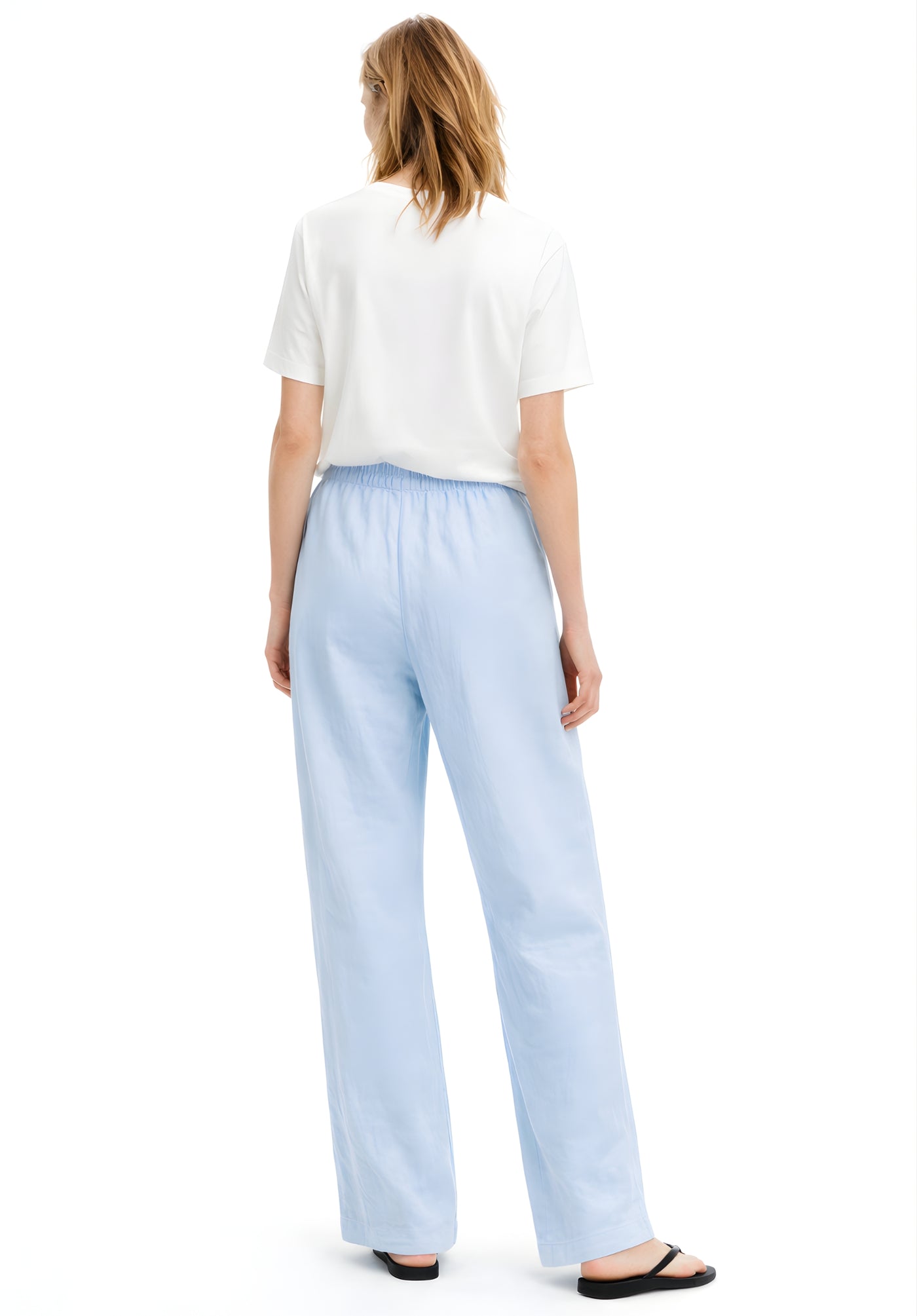Back view of sky blue linen blend baggy trousers