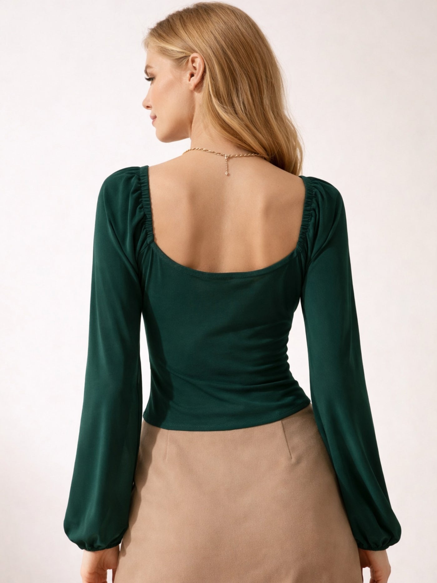 Back view of green wrap top