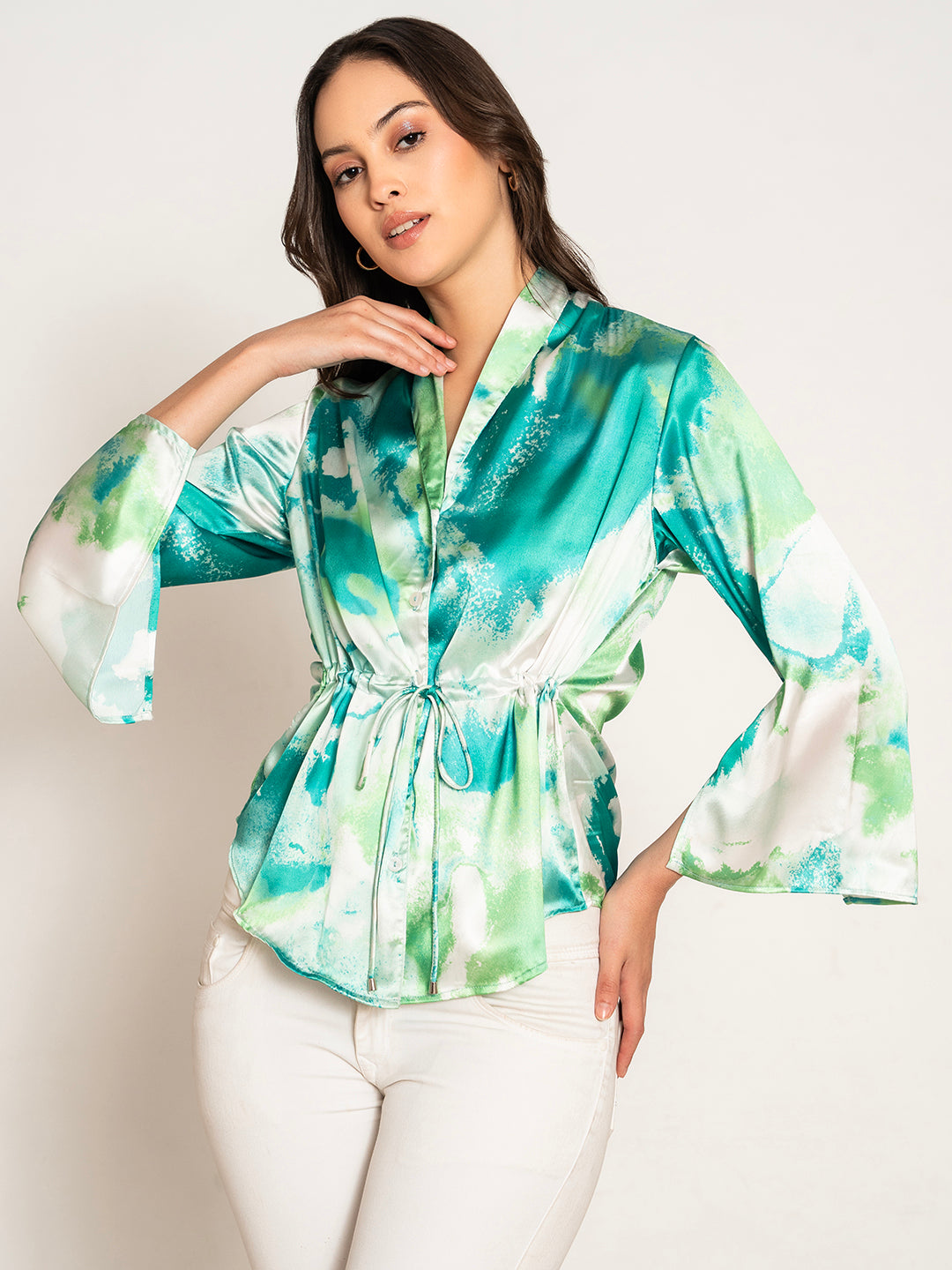 Front view of green printed kimono top with flared sleeves