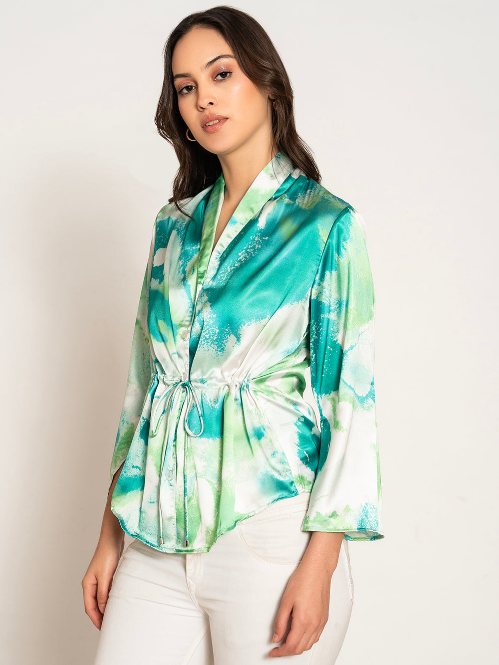 Lifestyle shot of woman wearing green printed kimono