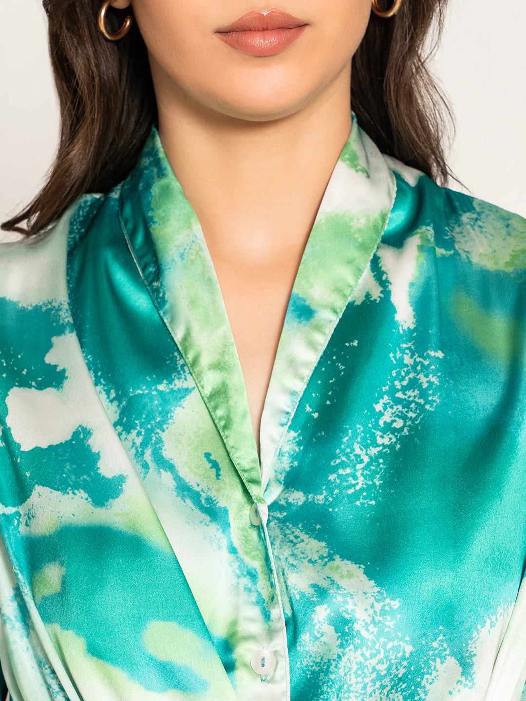 Detail of flared sleeve on green printed kimono