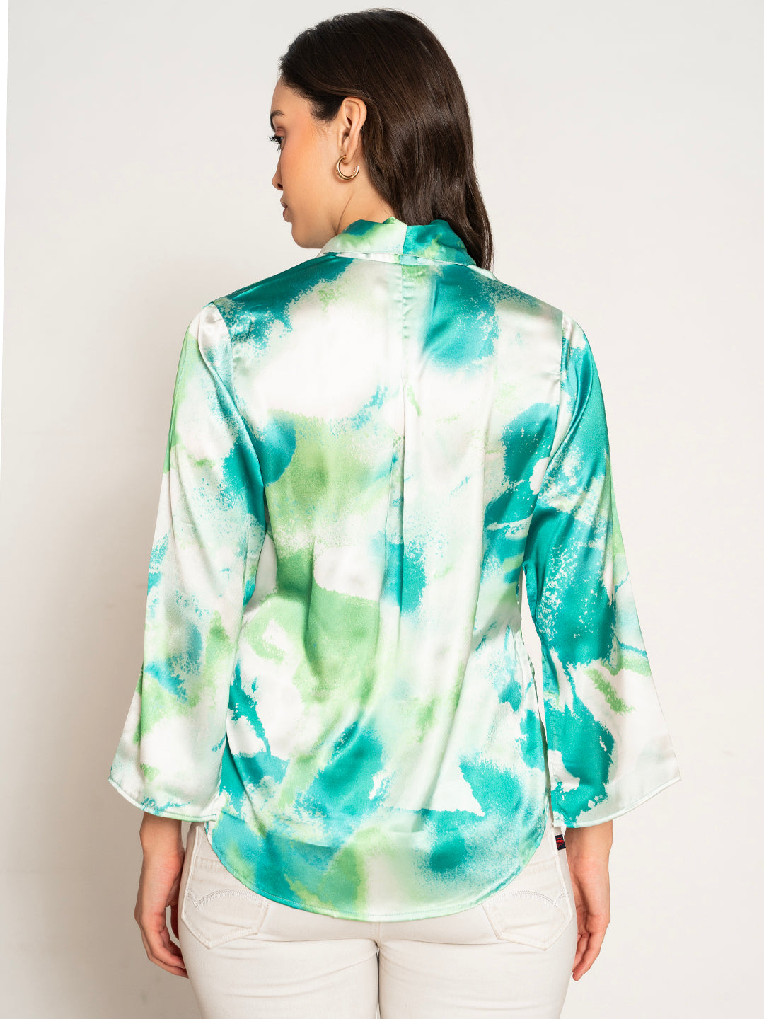Styled view of green kimono with denim shorts