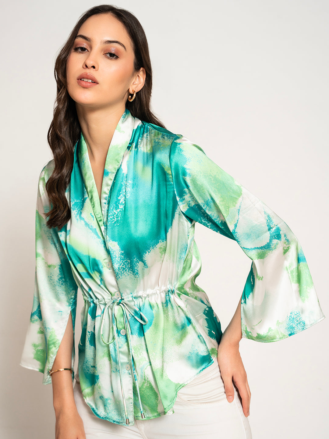 Side view of green printed kimono top with relaxed drape