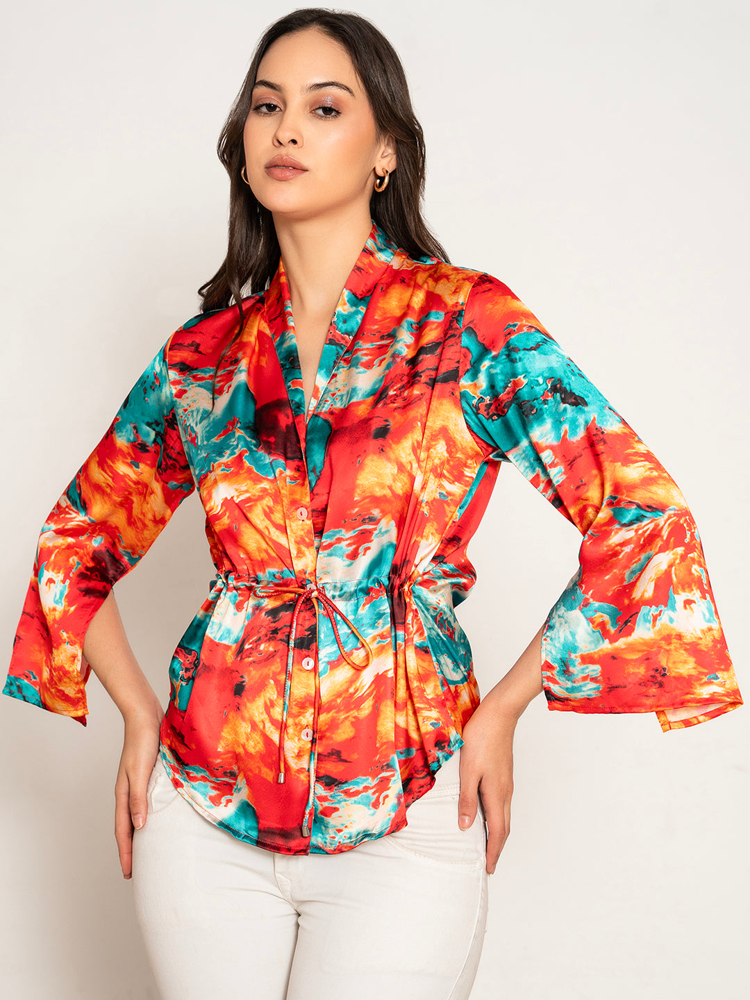 Front view of red printed kimono top with flared sleeves