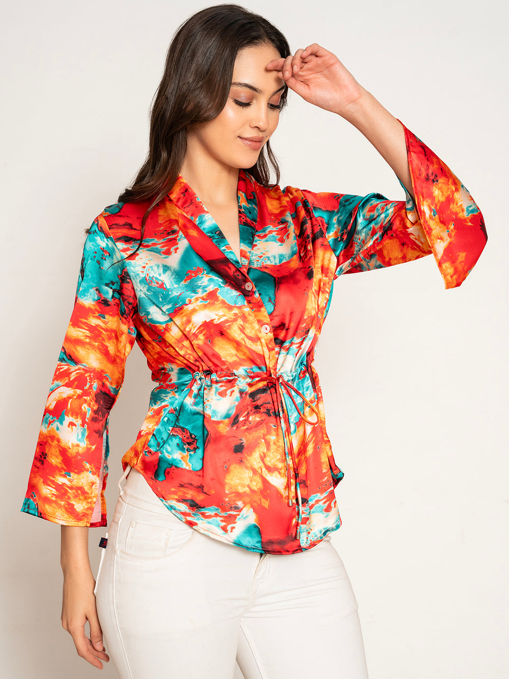 Lifestyle shot of woman wearing red printed kimono