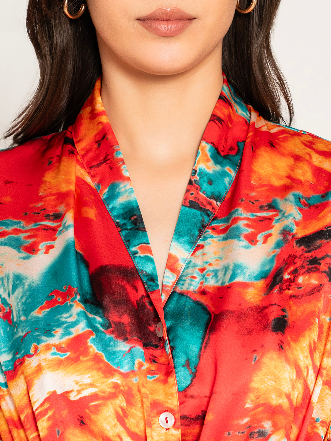 Styled view of red kimono with denim shorts
