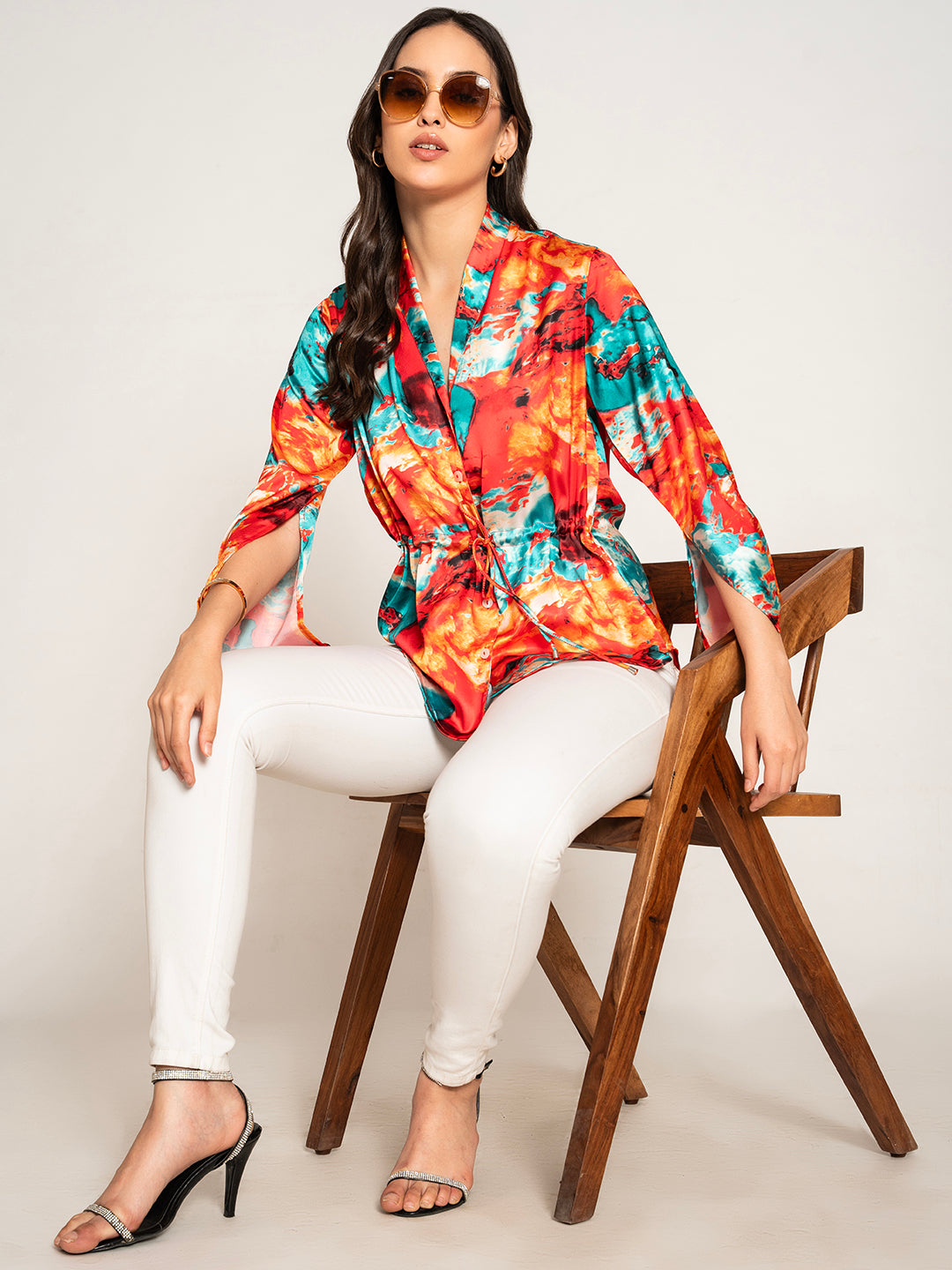 Side view of red printed kimono top with relaxed drape