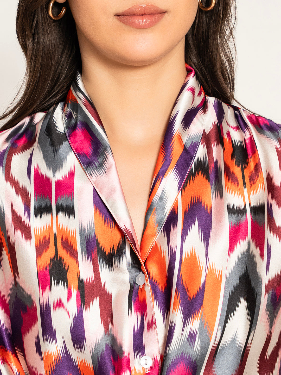Detail of flared sleeve on multi printed kimono