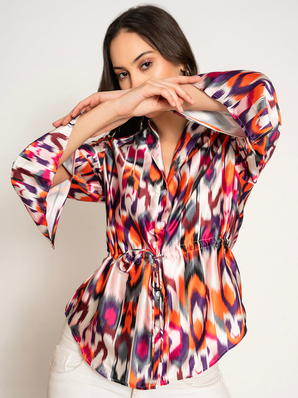 Lifestyle shot of woman wearing multi printed kimono