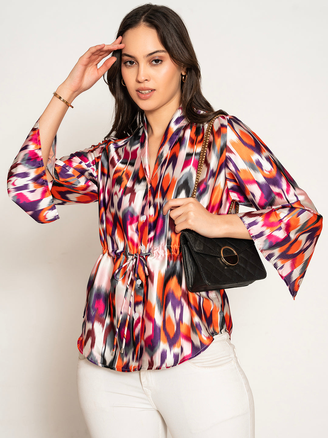 Front view of multi printed kimono top with flared sleeves