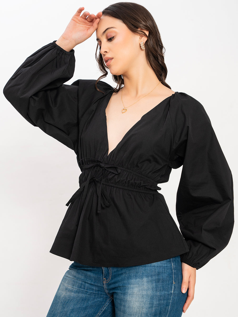 Side view of black V-neck poplin top