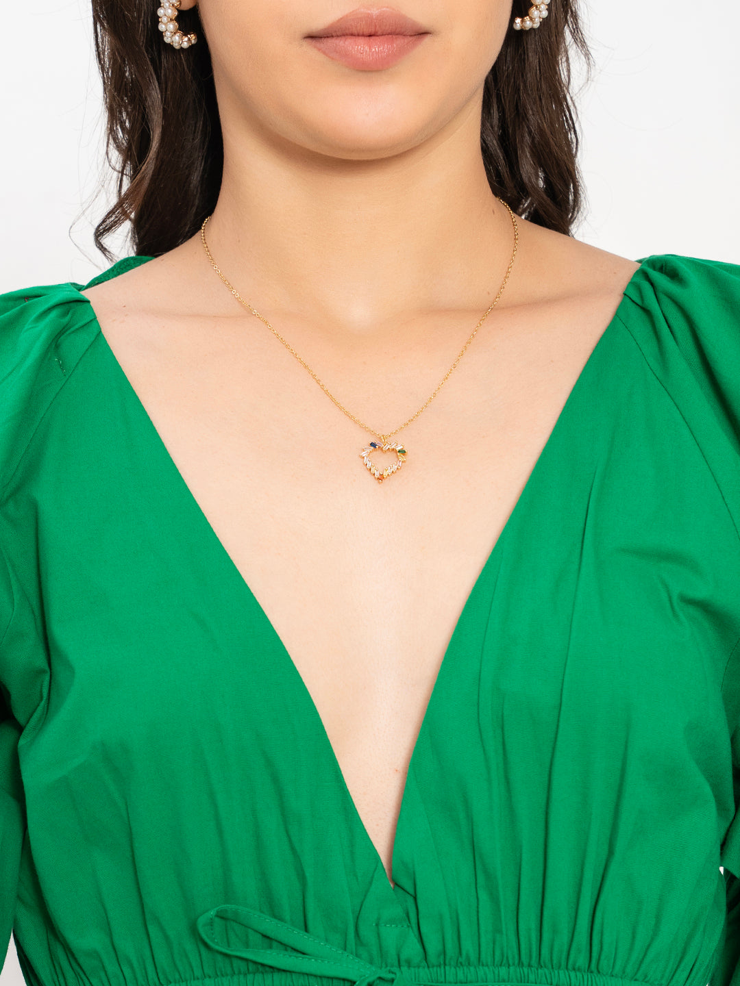 Close-up of green poplin cotton fabric and V-neckline