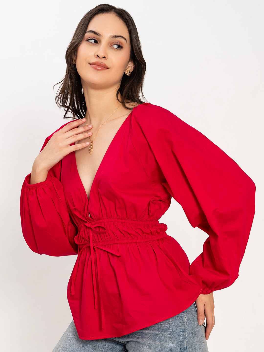 Close-up of pink poplin cotton fabric and V-neckline