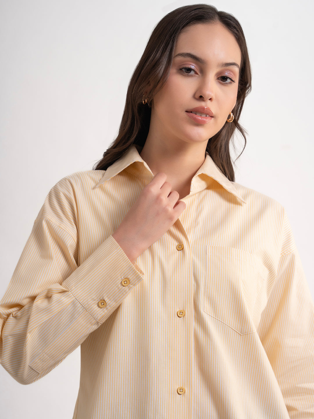 Side view of yellow striped cotton shirt