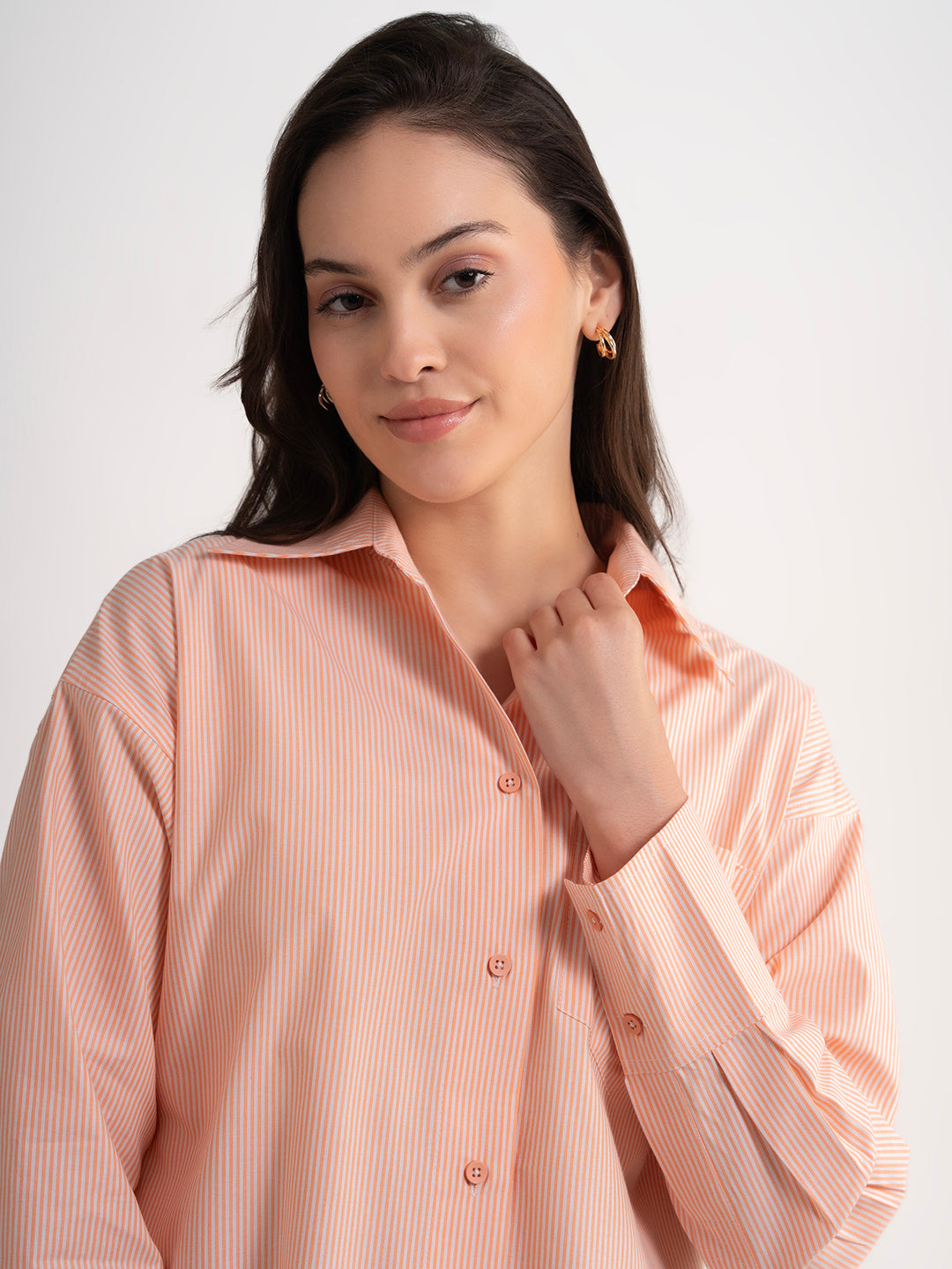 Side view of orange striped cotton shirt