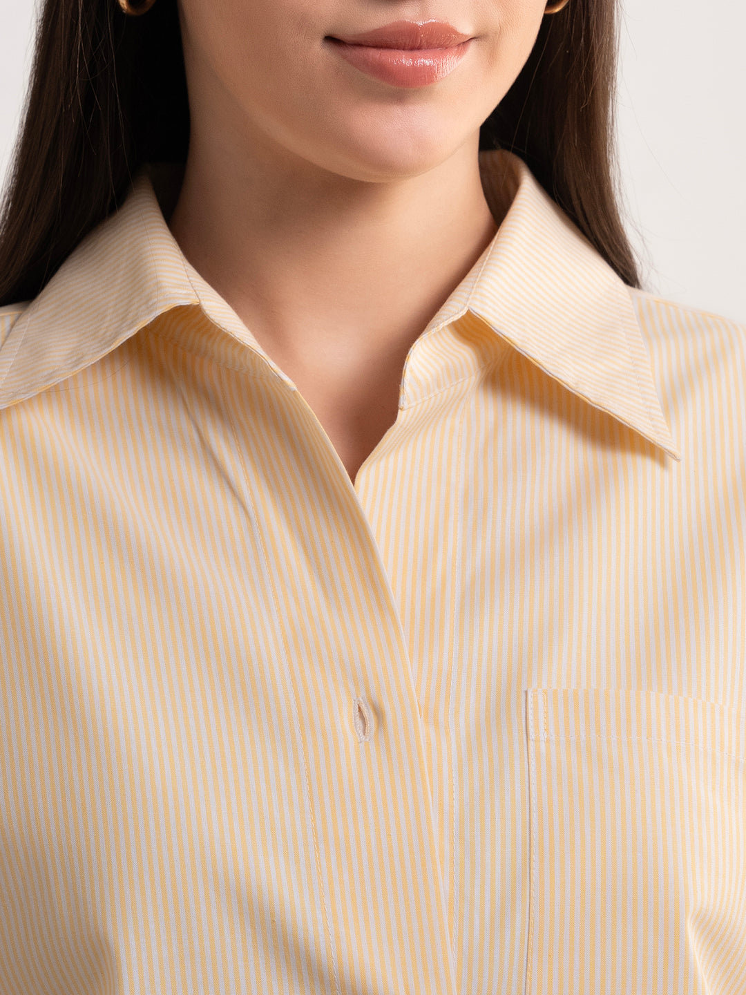 Side view of yellow cotton co-ord shirt and shorts