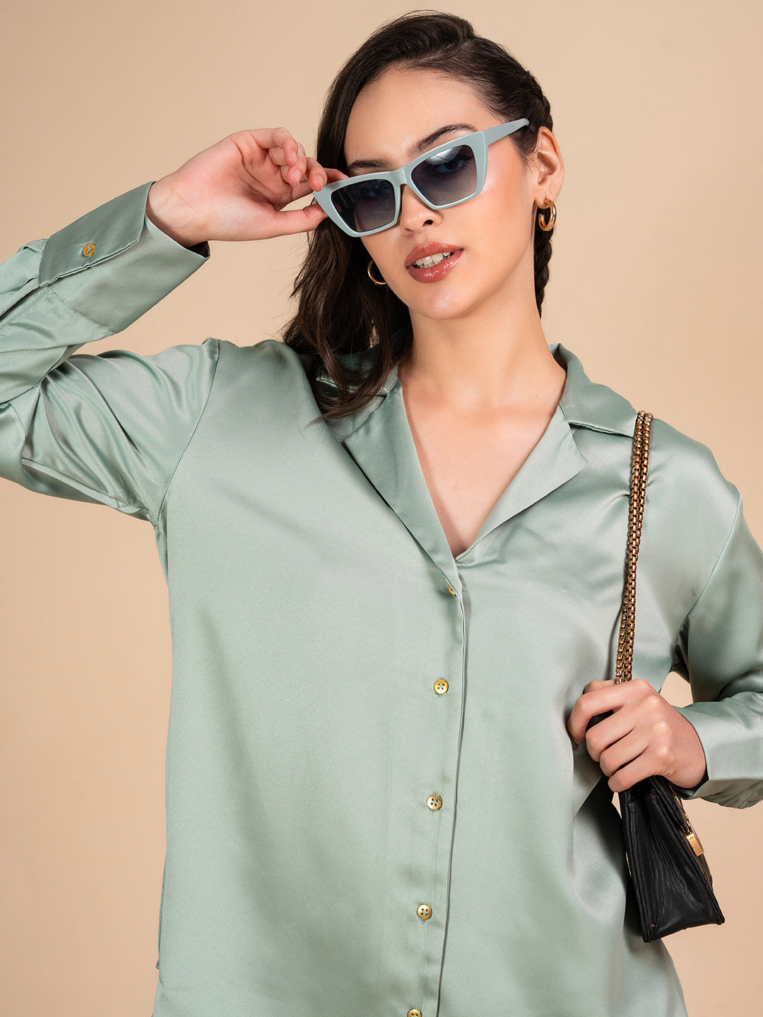 Front view of green satin Cuban collar shirt