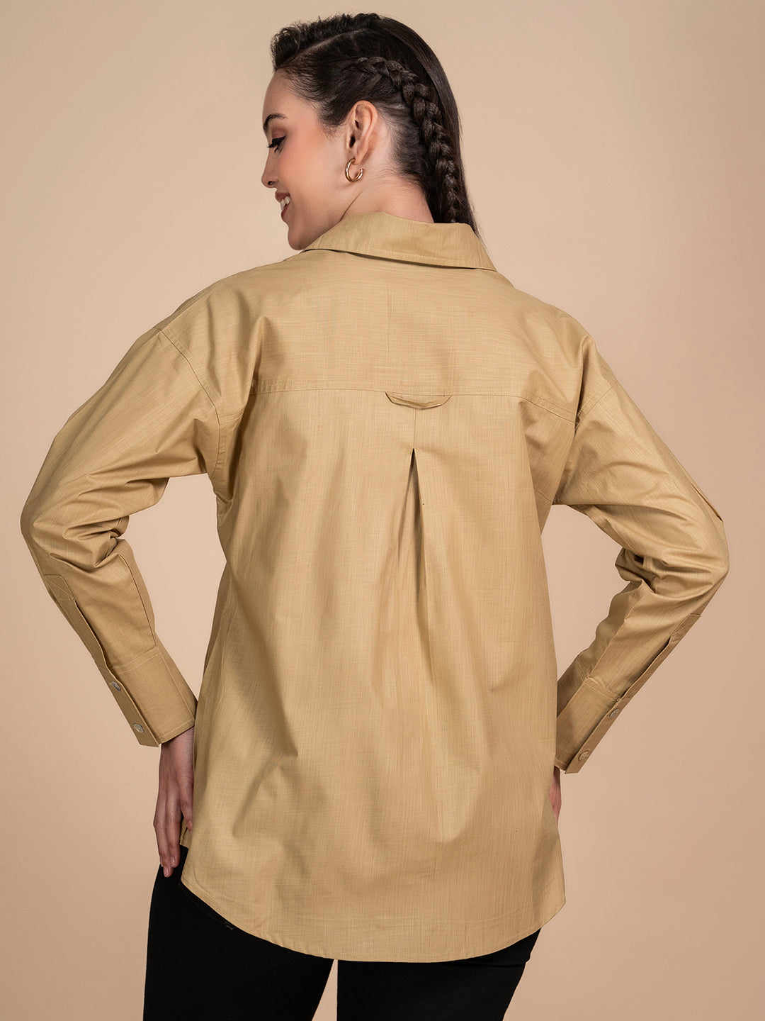 Back view of relaxed-fit beige linen shirt