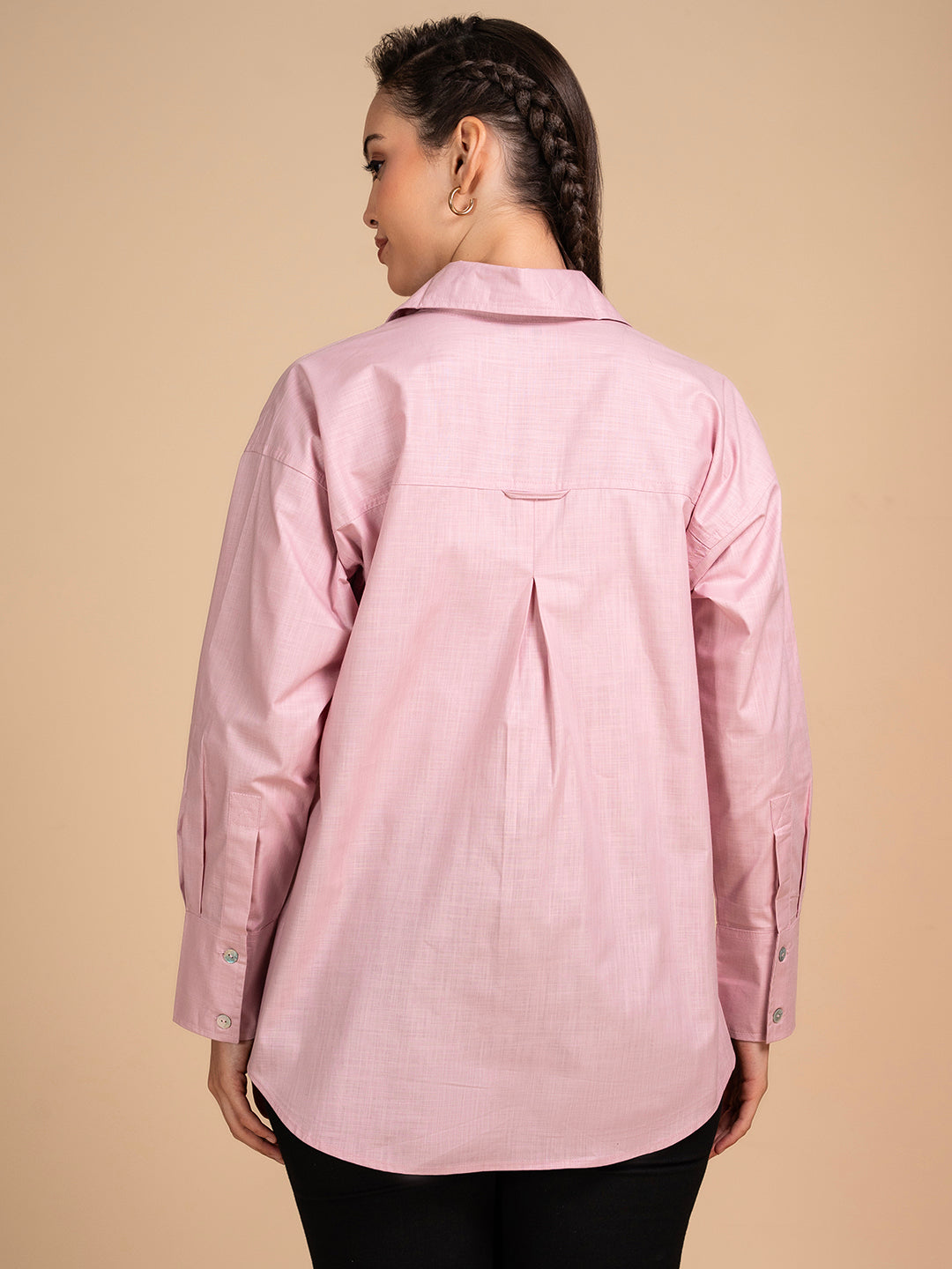 Detail of cuff on pink linen shirt