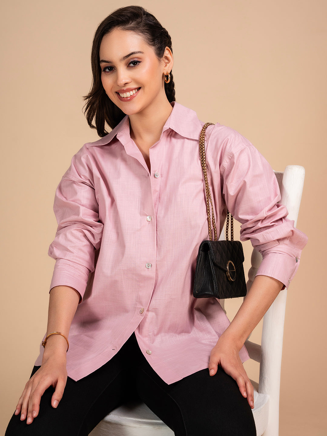Side view of pink linen shirt with relaxed fit