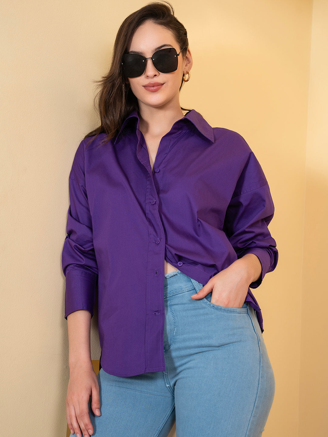 Woman wearing purple cotton oversized shirt - front view