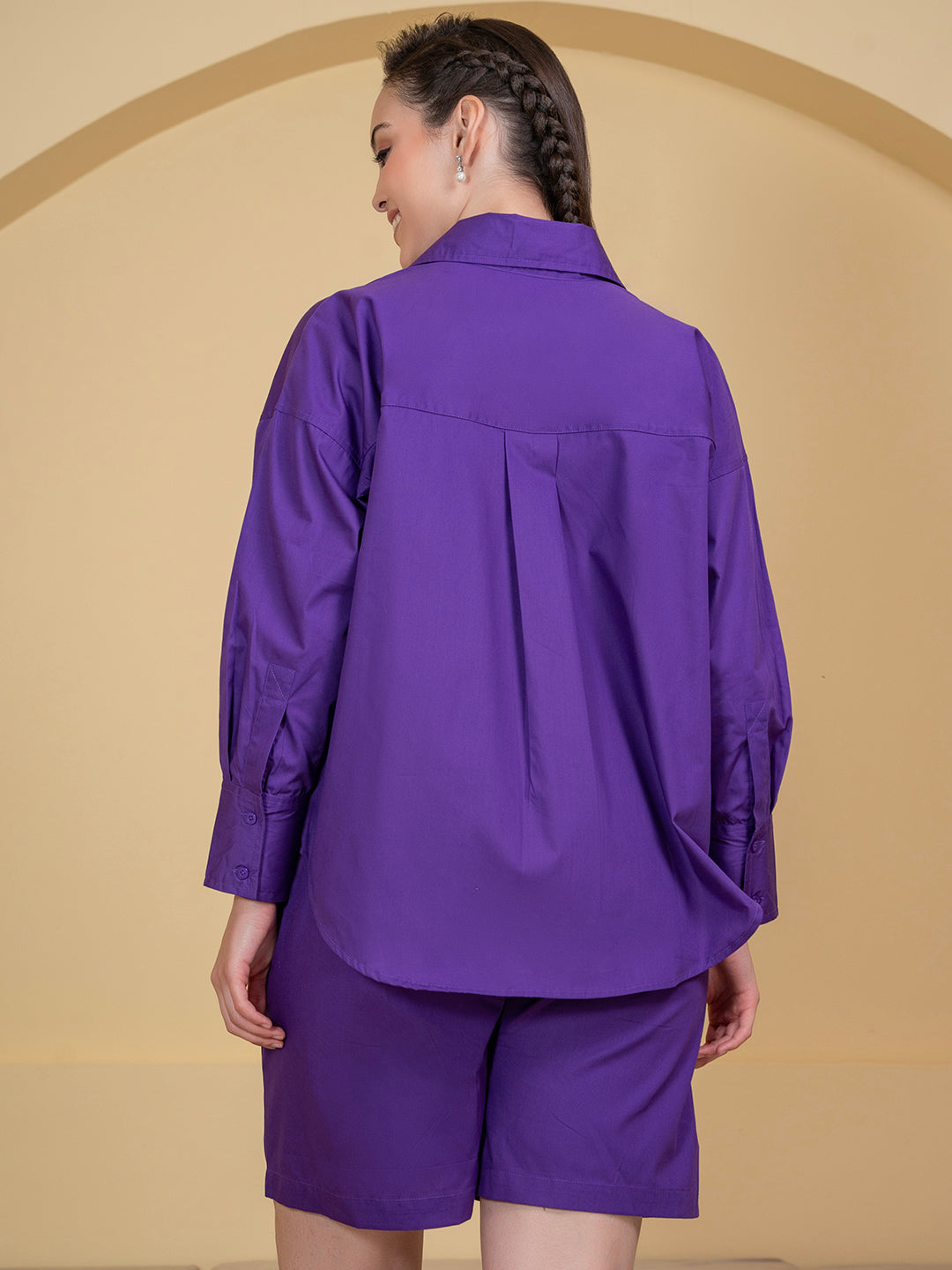 Detail of buttons on purple poplin co-ord shirt