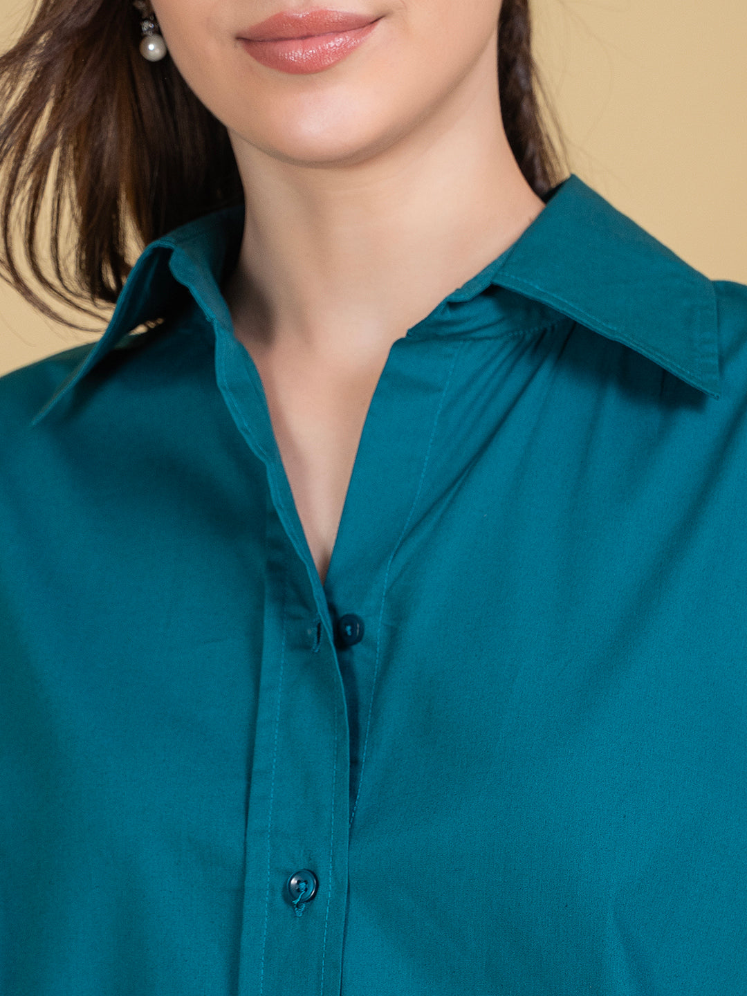 Side view of turquoise cotton co-ord shirt and pants