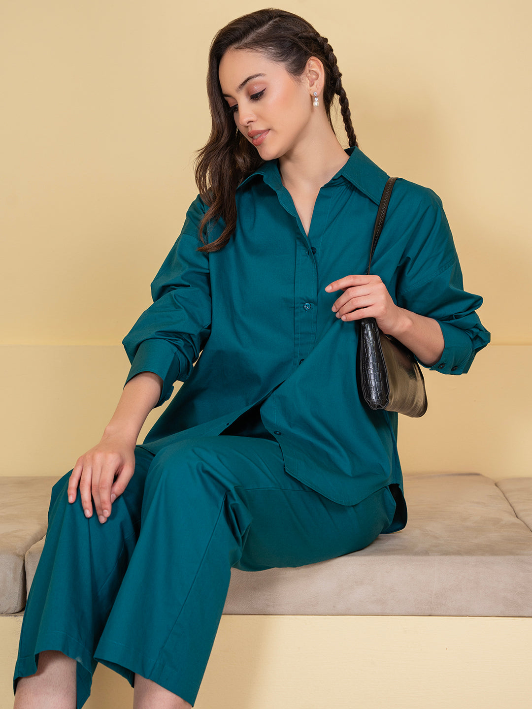 Styled view of turquoise co-ord with sandals
