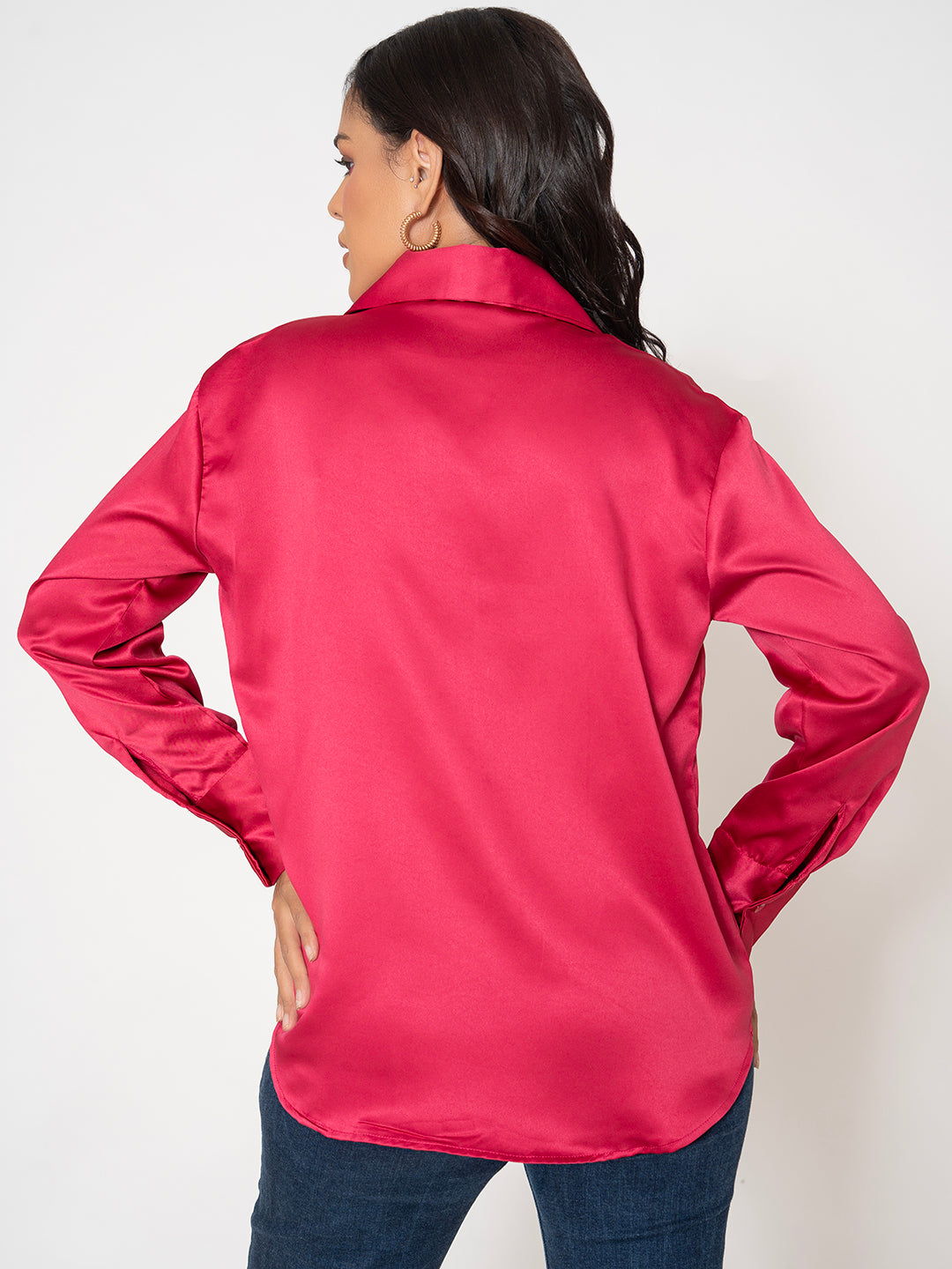 Close-up of spread collar on pink satin shirt