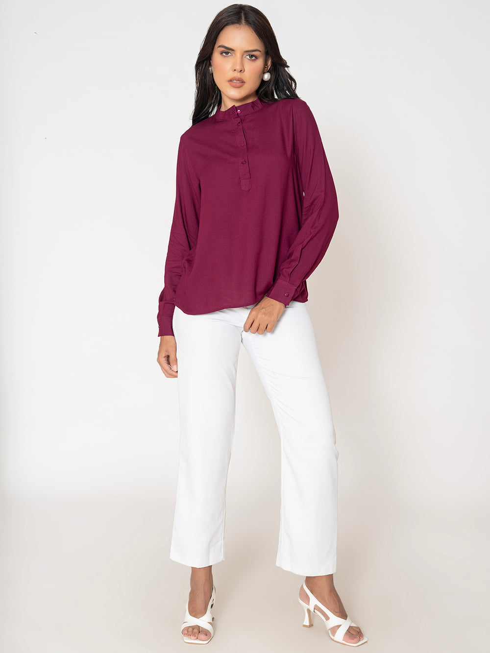 Side view of wine rayon top showing fluid drape