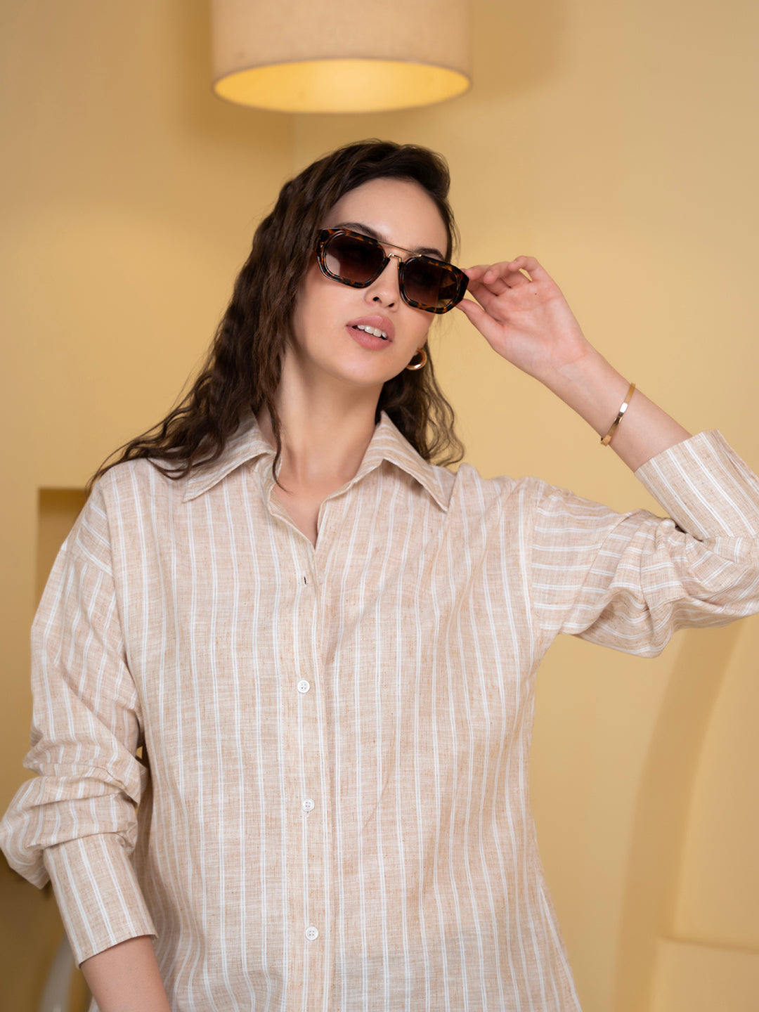 Full-length view of white and beige linen blend shirt