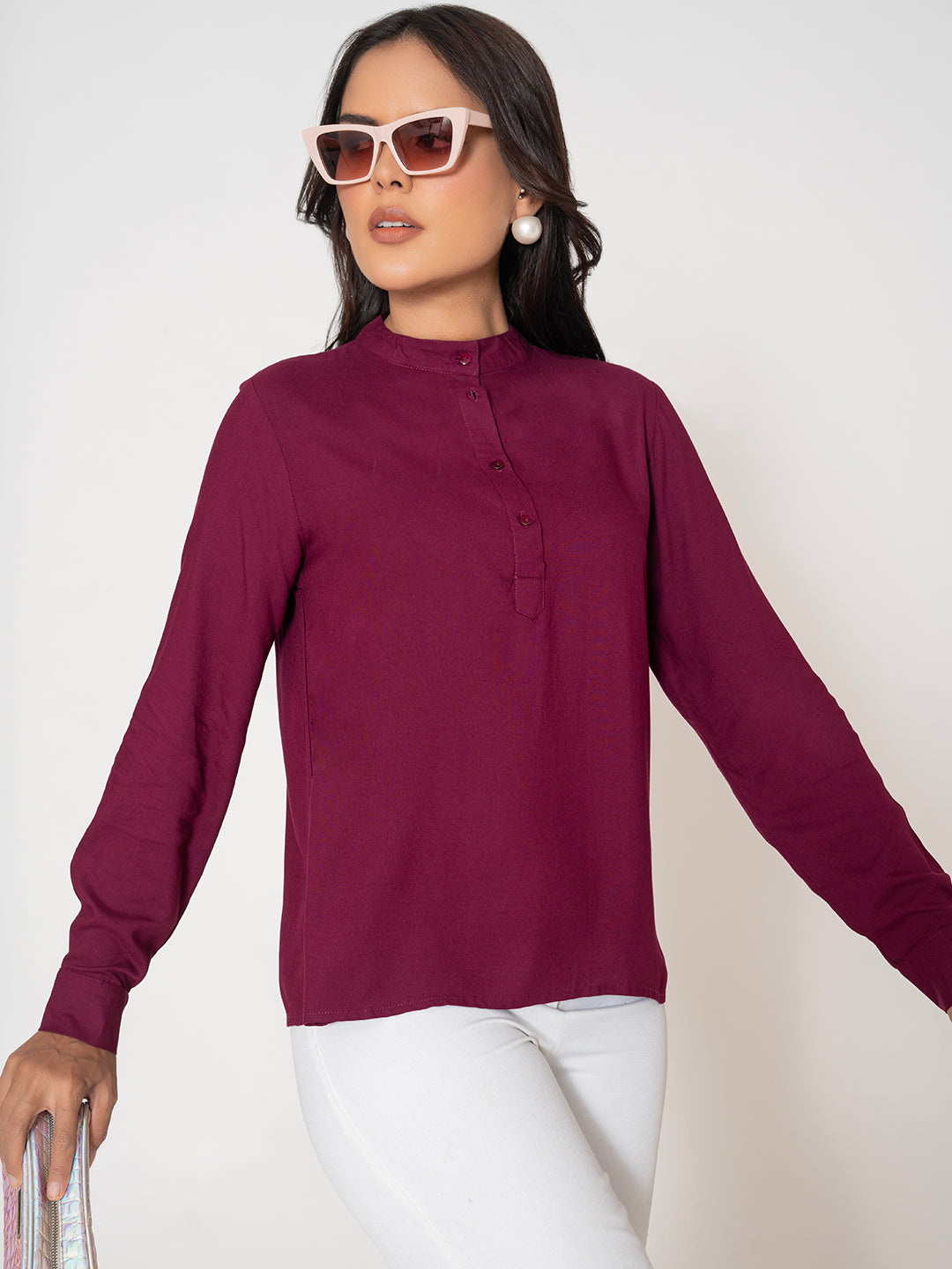 Lifestyle shot of model in wine rayon top