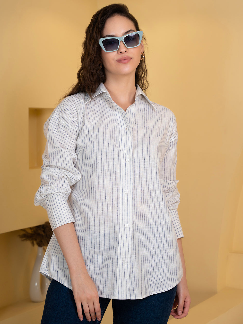 Side view of white and blue linen striped shirt