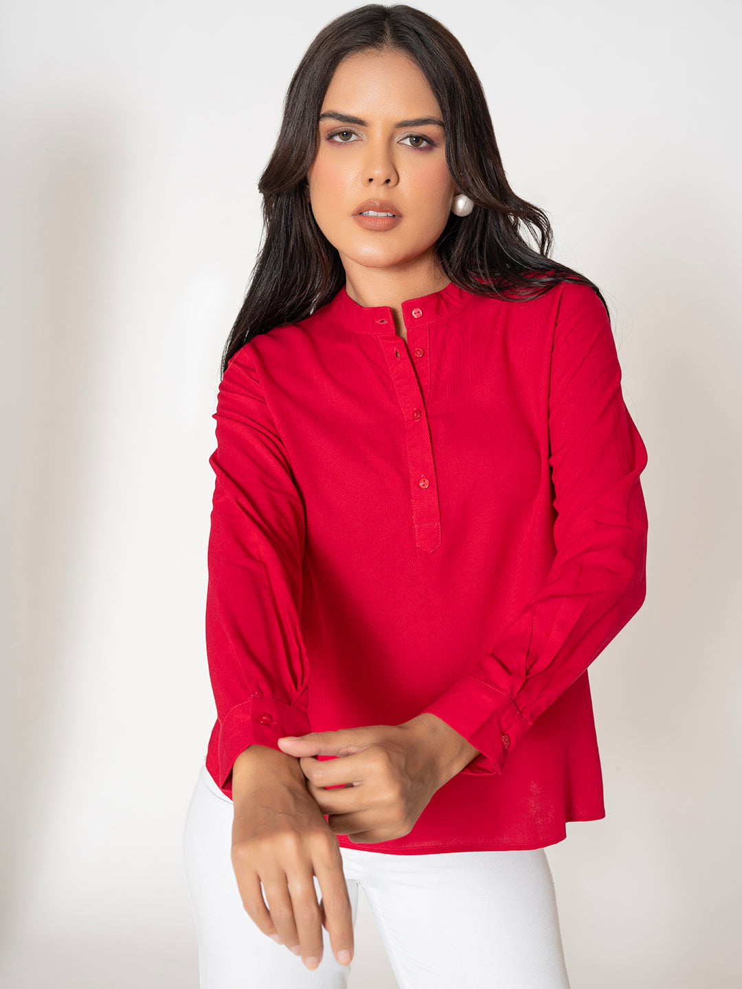 Front view of hot pink rayon top with relaxed fit