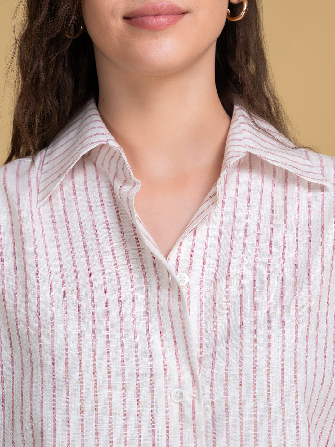 Detail of cuff on white pink linen striped shirt