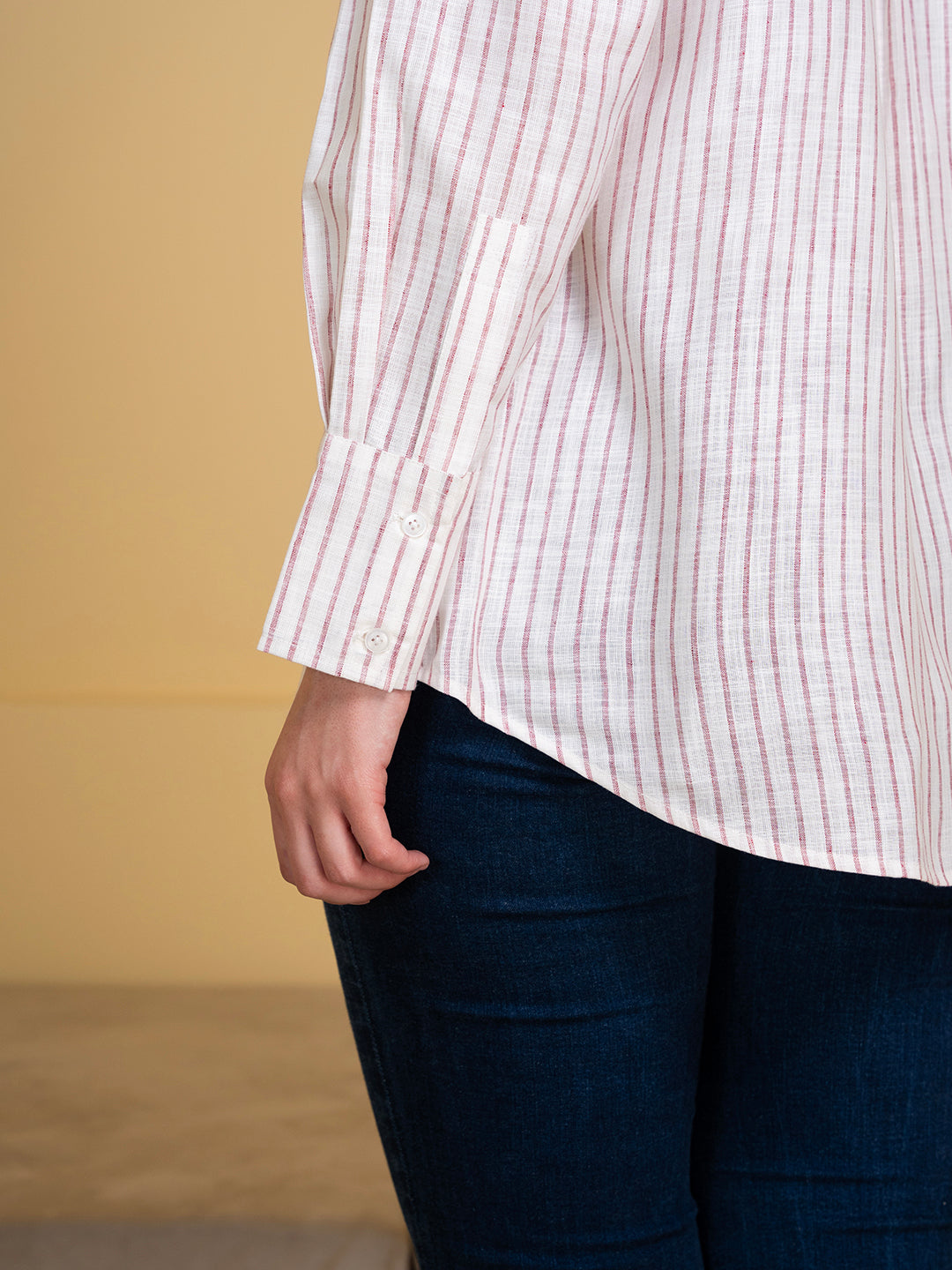 Back view of relaxed-fit white and pink linen shirt