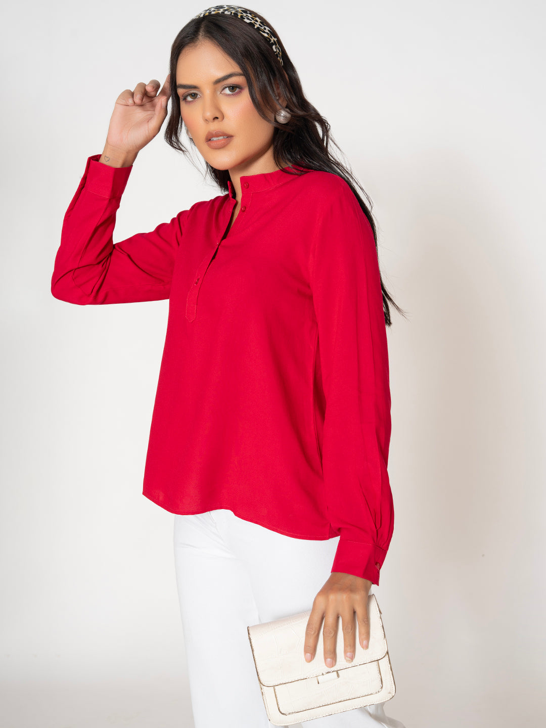 Close-up of neckline on hot pink rayon top
