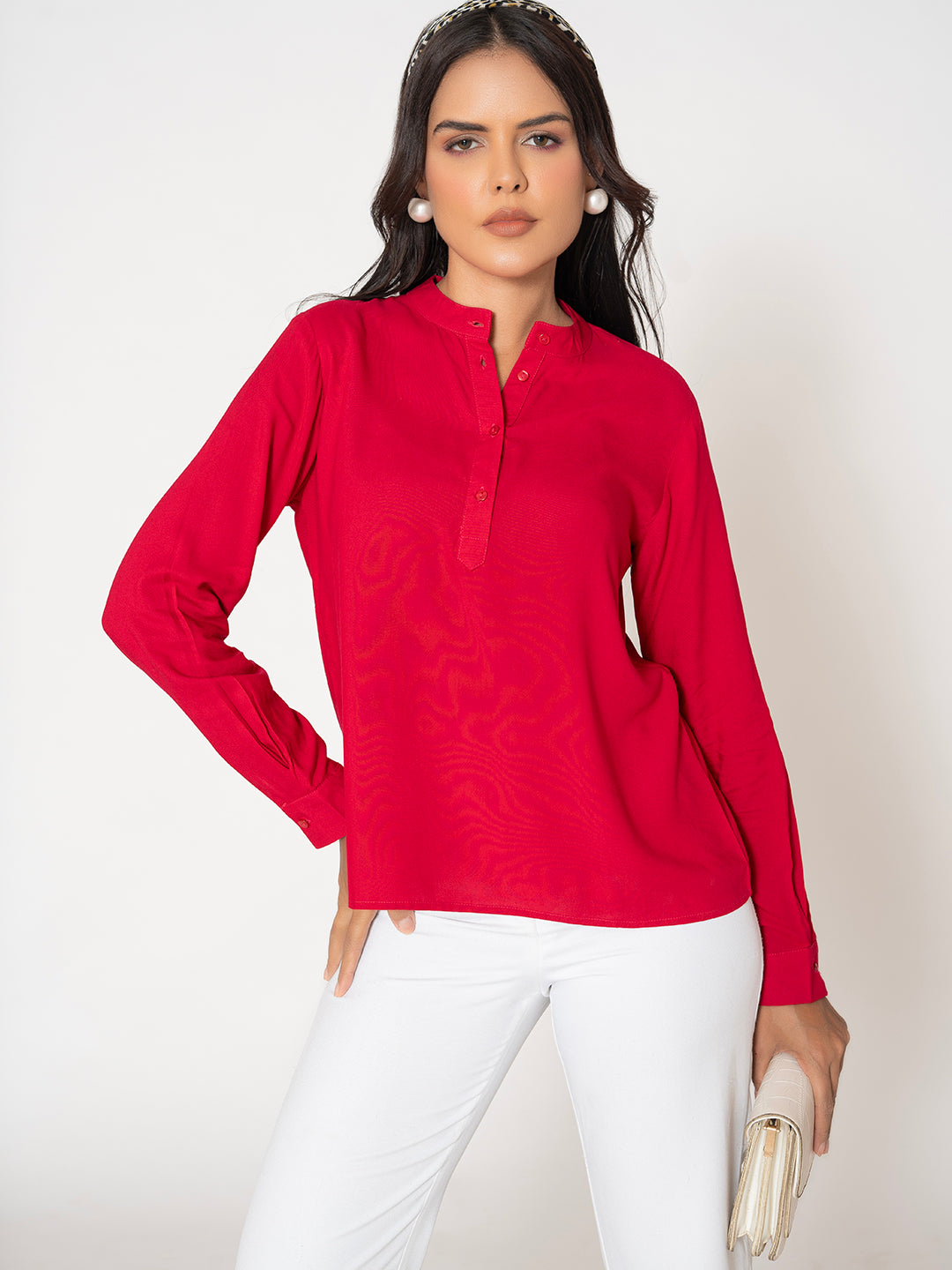 Lifestyle shot of model in hot pink rayon top